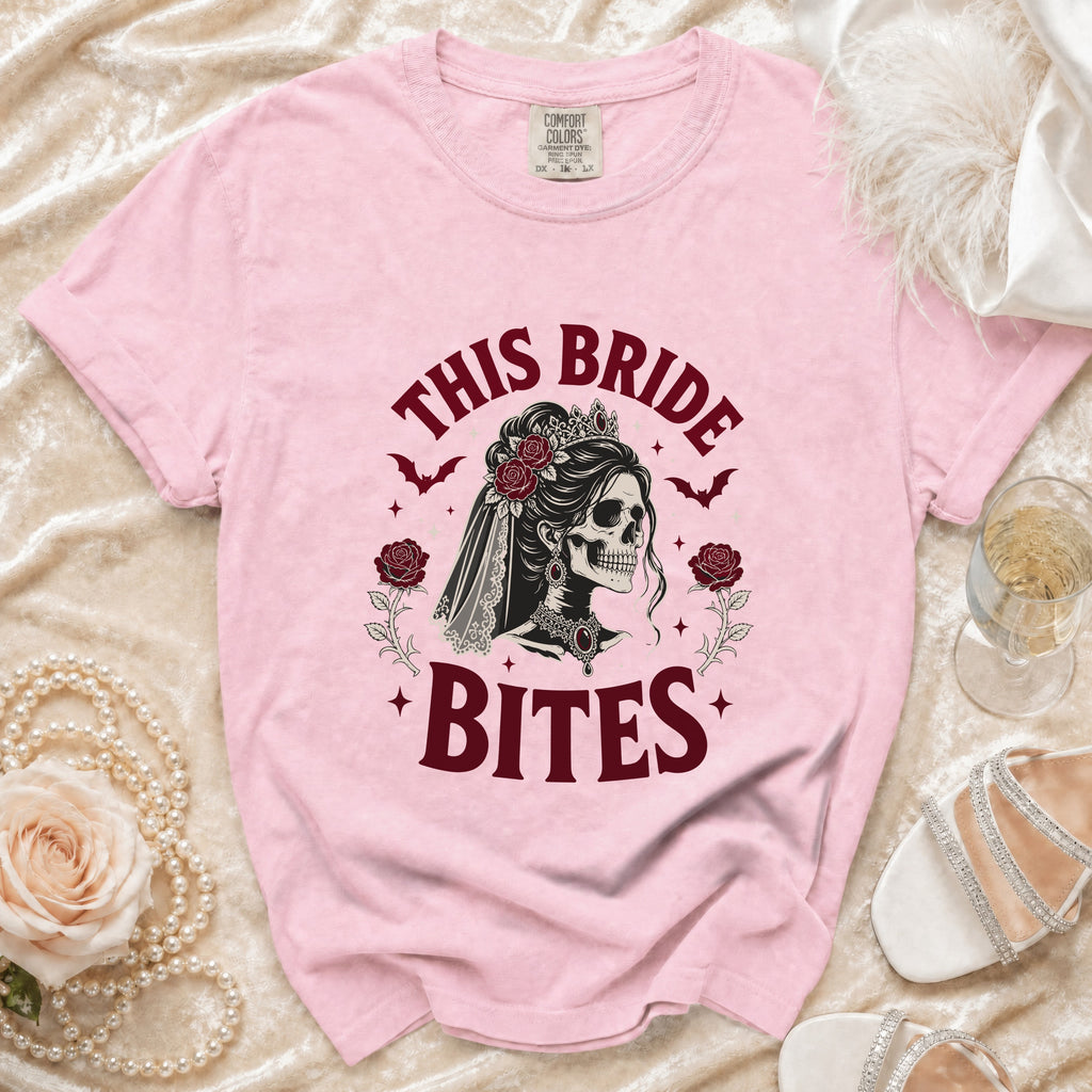 Pink t-shirt with "This Bride Bites" skull graphic and dark red bats.