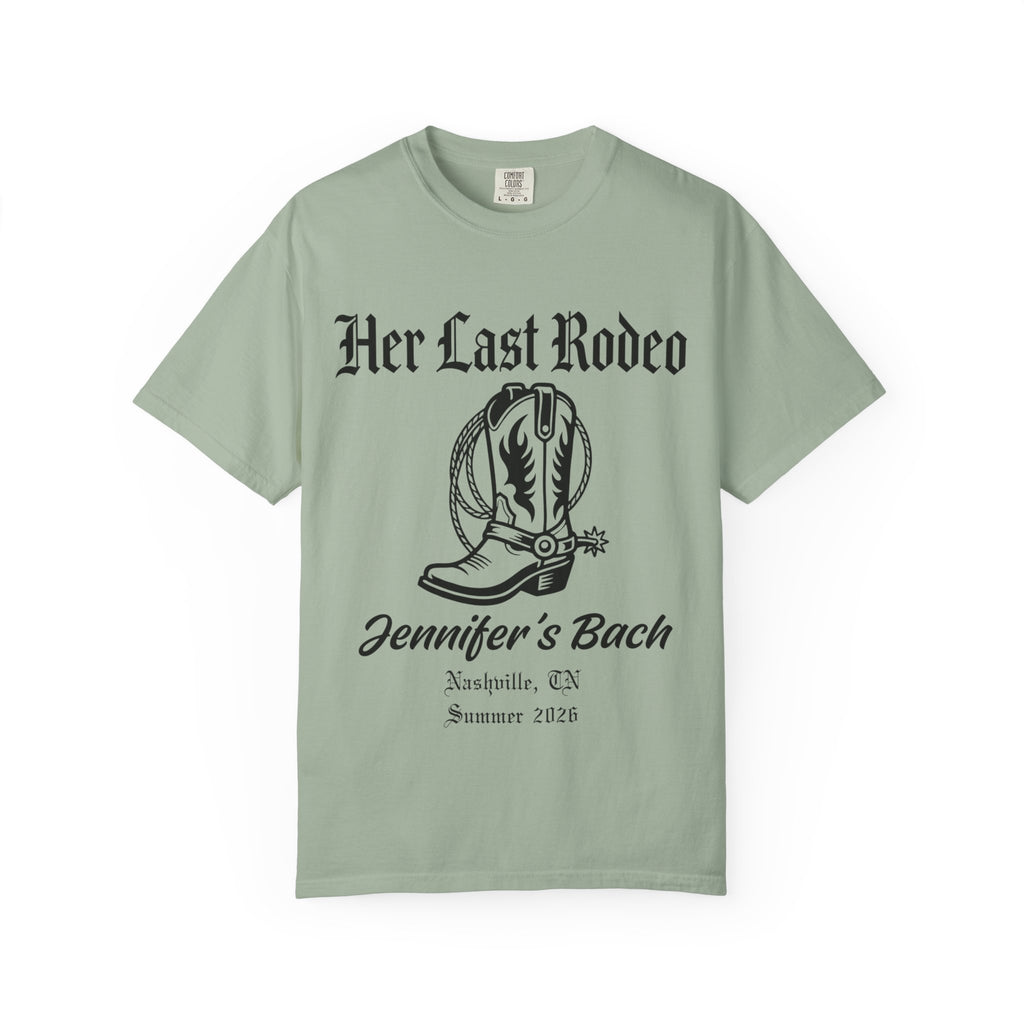 Green t-shirt with "Her Last Rodeo" and cowboy boot graphic.