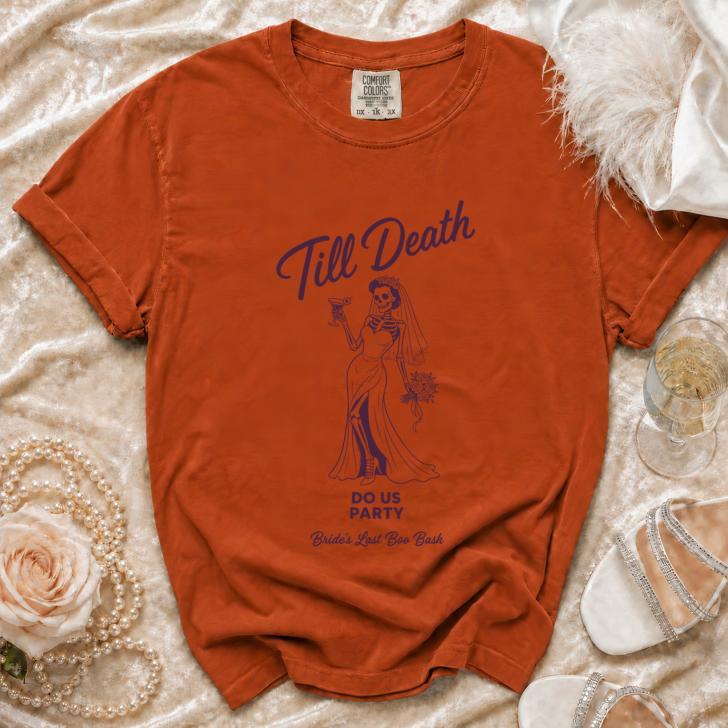 Orange t-shirt with "Till Death" skeleton bride graphic and "Bride's Last Boo Bash" text.