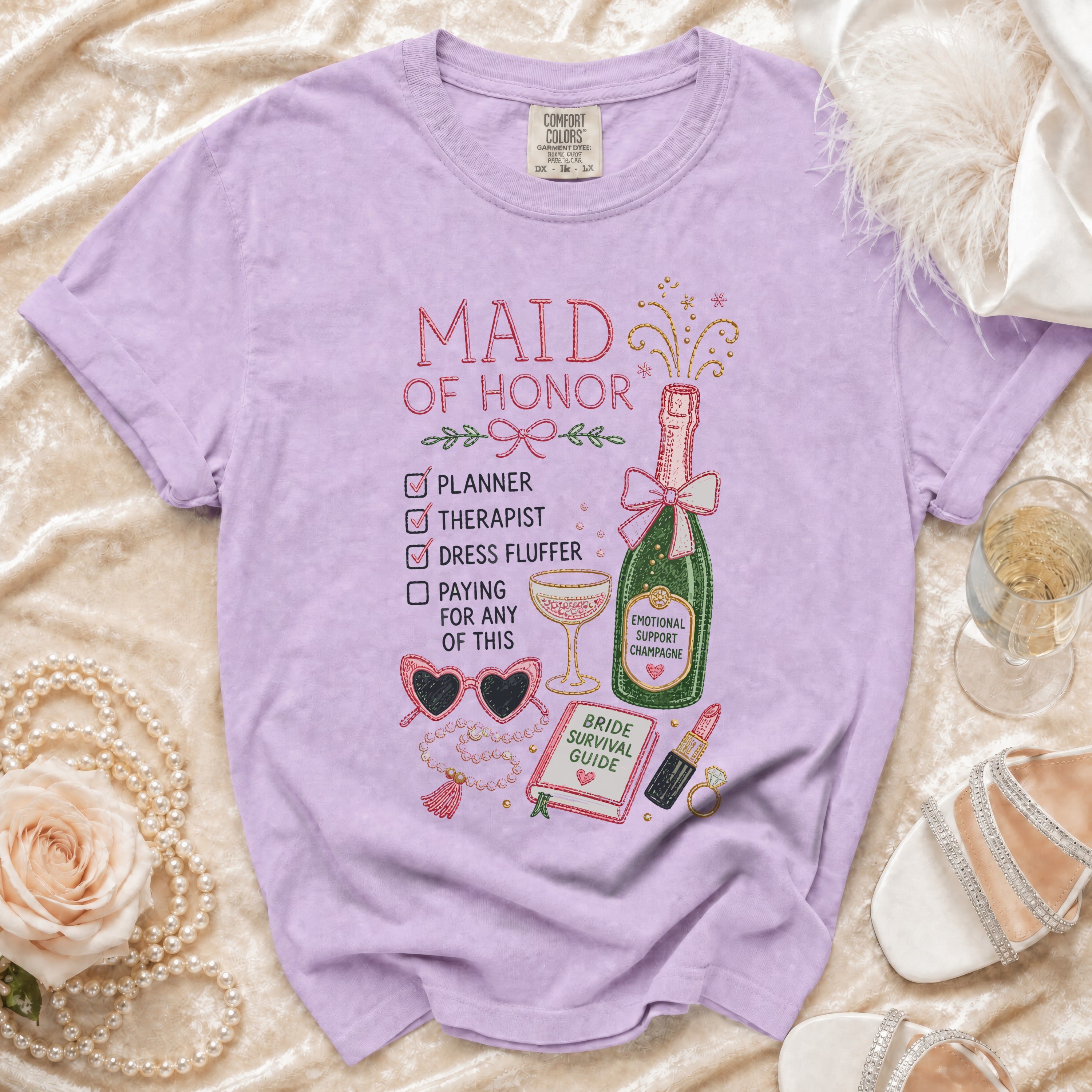 Lavender t-shirt with "Maid of Honor" checklist and champagne illustration.