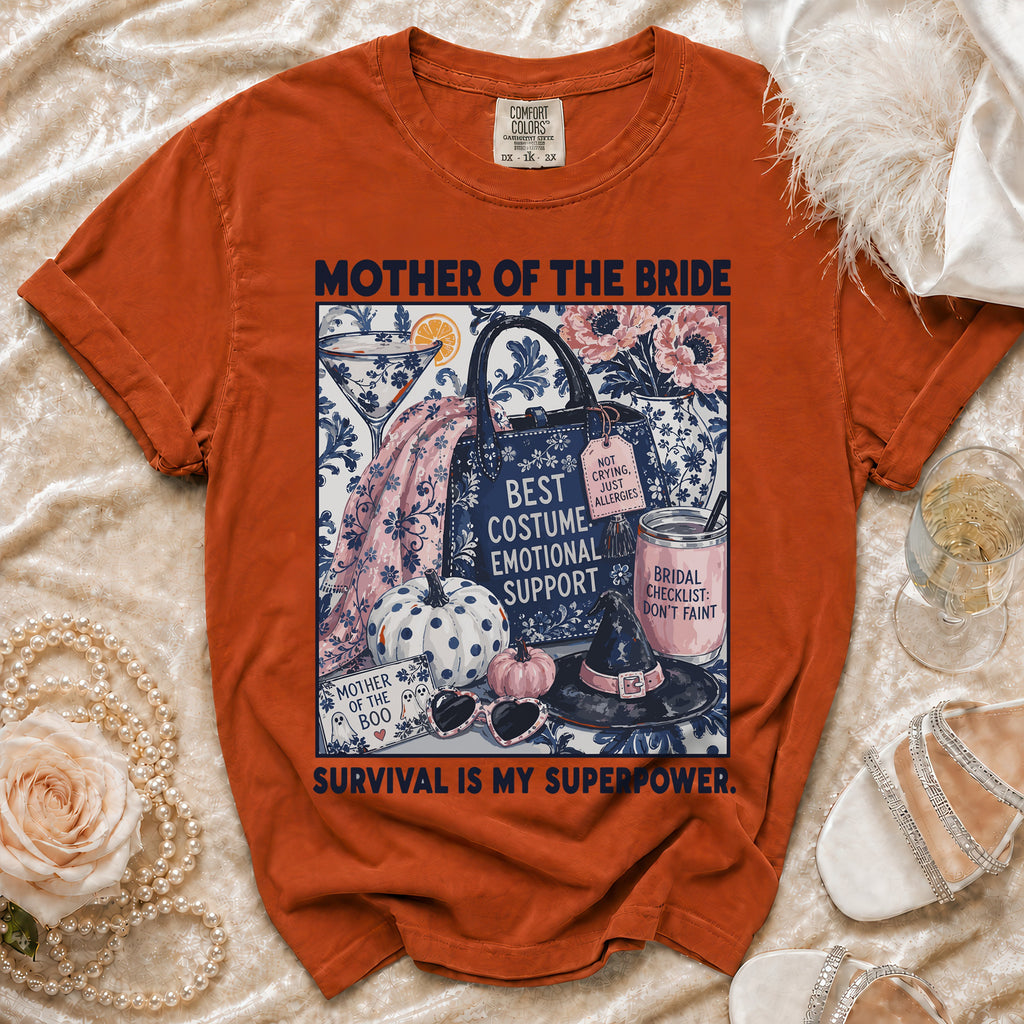 Orange t-shirt with "Mother of the Bride Survival is My Superpower" graphic.