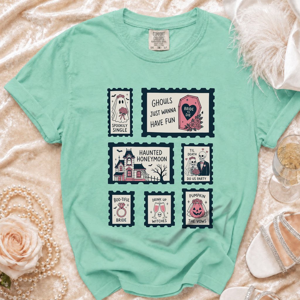 Mint t-shirt with "Ghouls Just Wanna Have Fun" and Halloween-themed stamps.