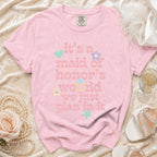 Pink t-shirt with "it's a maid of honor's world we just plan in it" text.