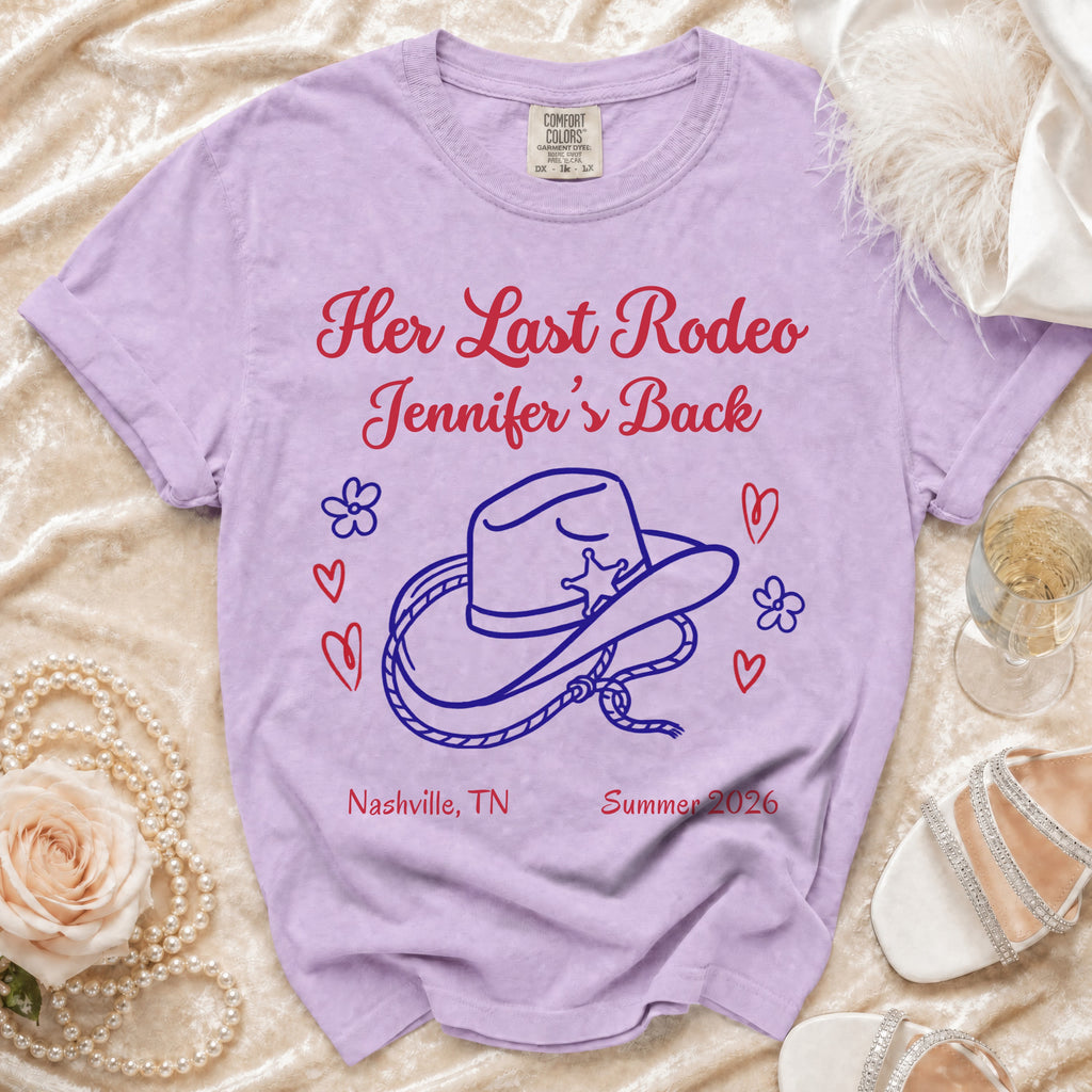Purple t-shirt with "Her Last Rodeo Jennifer's Back" text, hat graphic, hearts, and Nashville 2026.