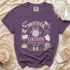 Purple shirt with "Mother of the Groom" and spooky/cute graphics.