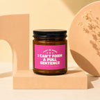 Amber jar candle with pink label that reads "Light me when I can't form a full sentence".