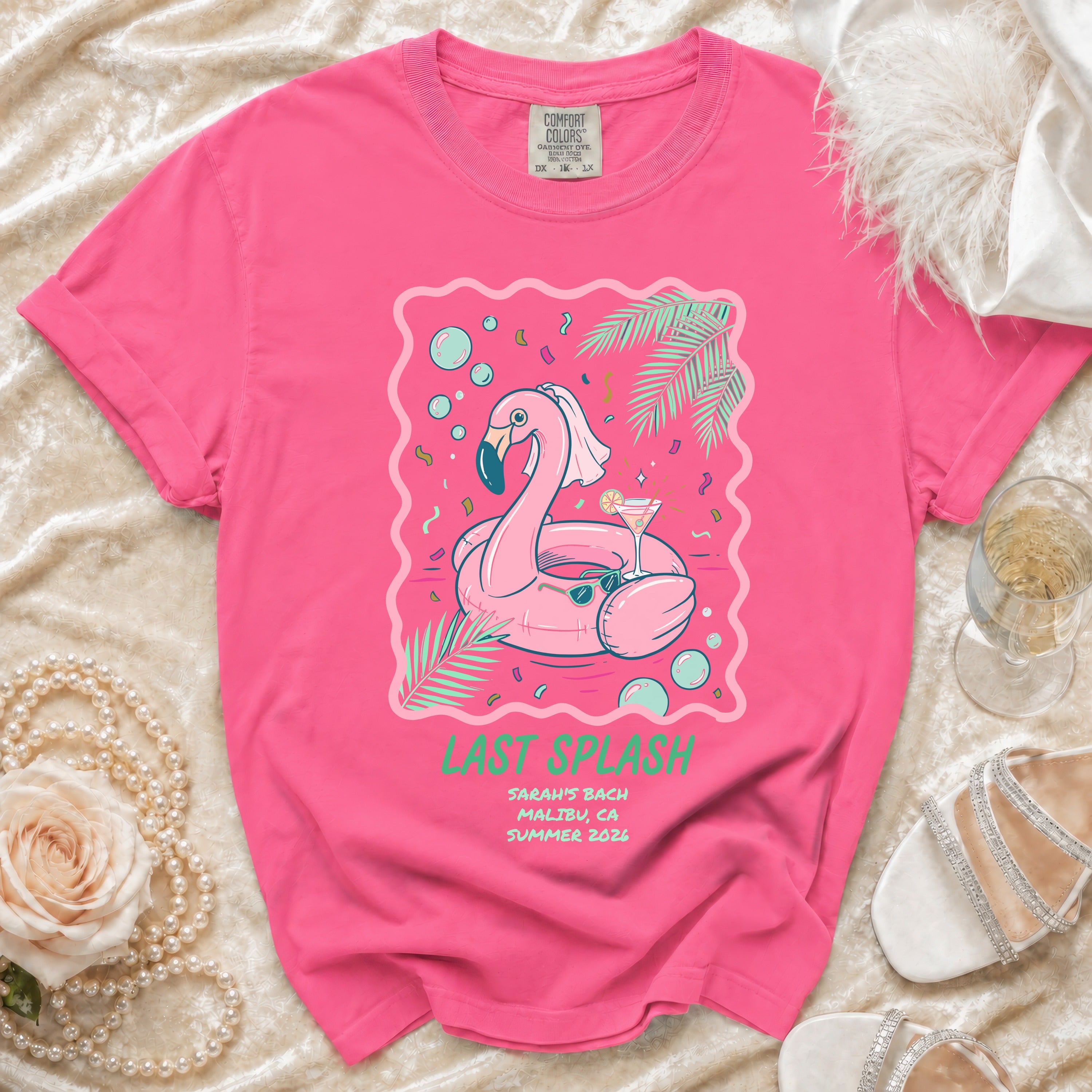 Pink t-shirt with "Last Splash Sarah's Bach Malibu Summer 2026" design.