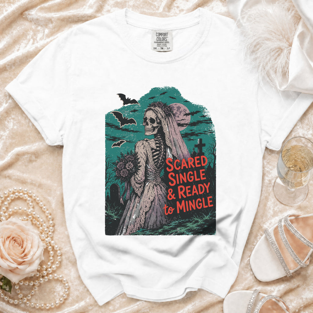 White t-shirt featuring skeleton bride graphic with text "Scared Single & Ready to Mingle".