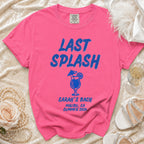 Pink t-shirt with "LAST SPLASH" in blue text, cocktail graphic, and "SARAH'S BACH MALIBU, CA SUMMER 2026".