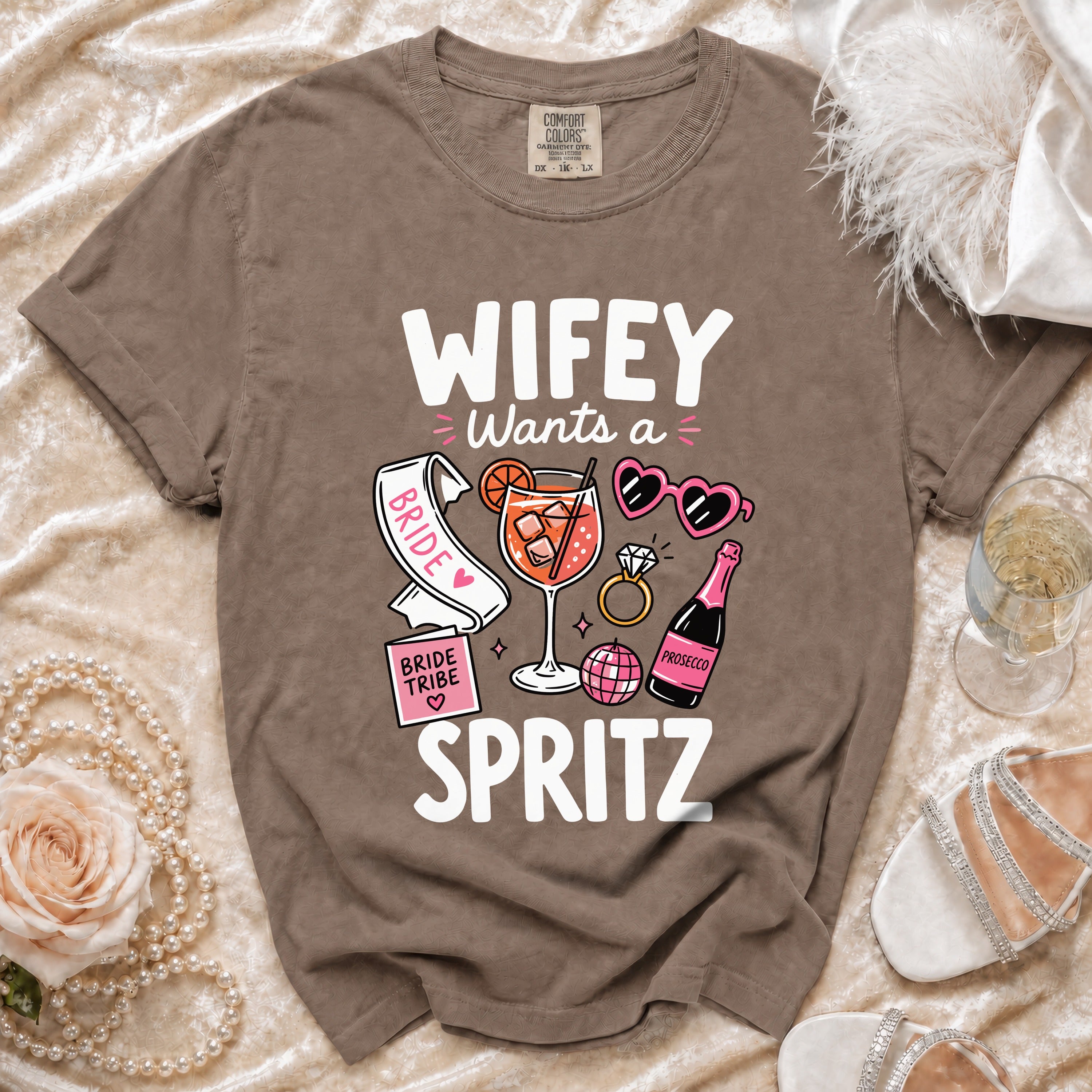 "Wifey Wants a Spritz" graphic t-shirt with bride, drink, and prosecco icons.
