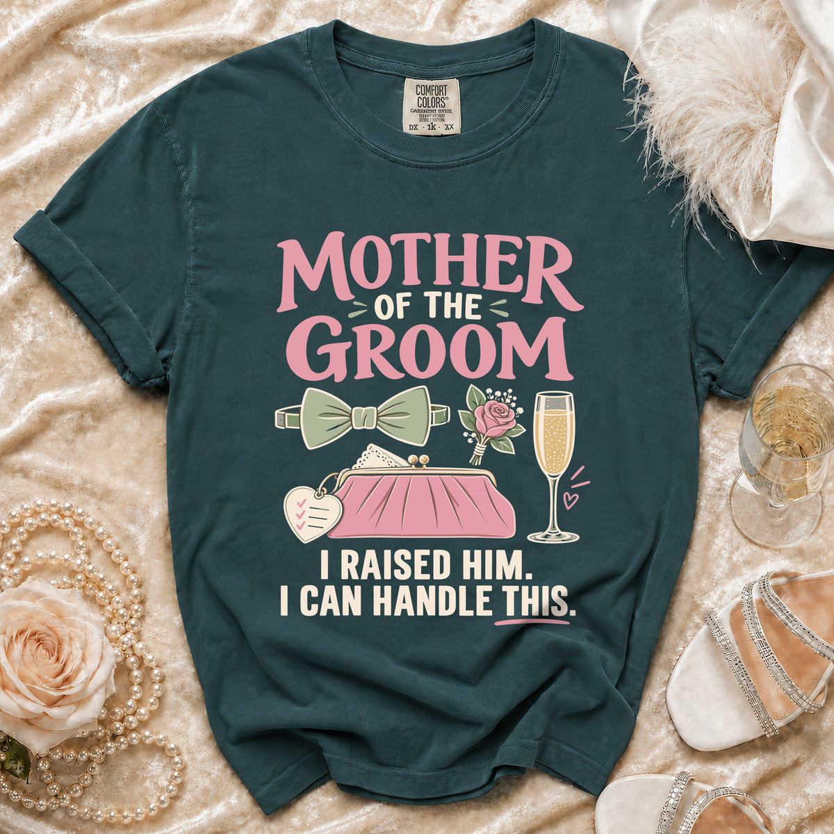 Dark green shirt with "MOTHER OF THE GROOM" text, purse, and wedding icons.
