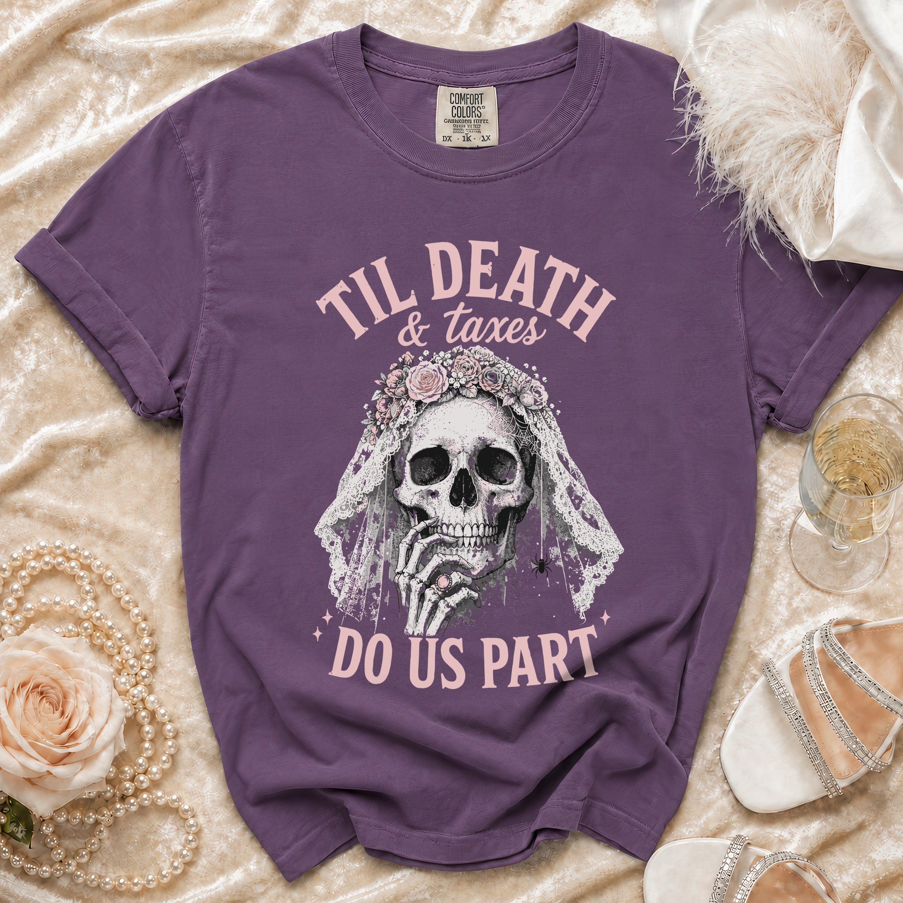 Purple t-shirt with skull, veil, and text "Til Death & Taxes Do Us Part".