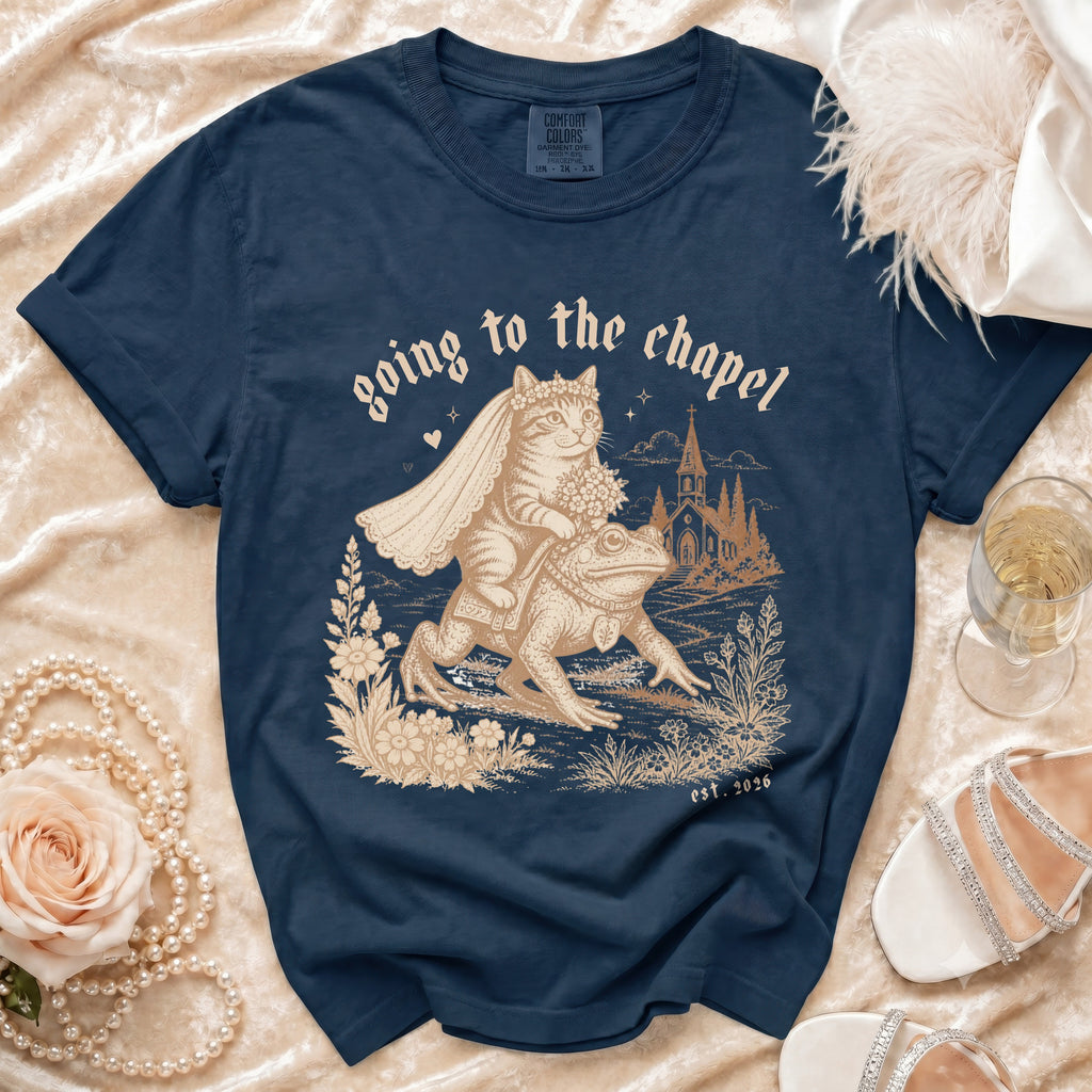 Navy t-shirt with cat bride on frog text "going to the chapel est. 2026".