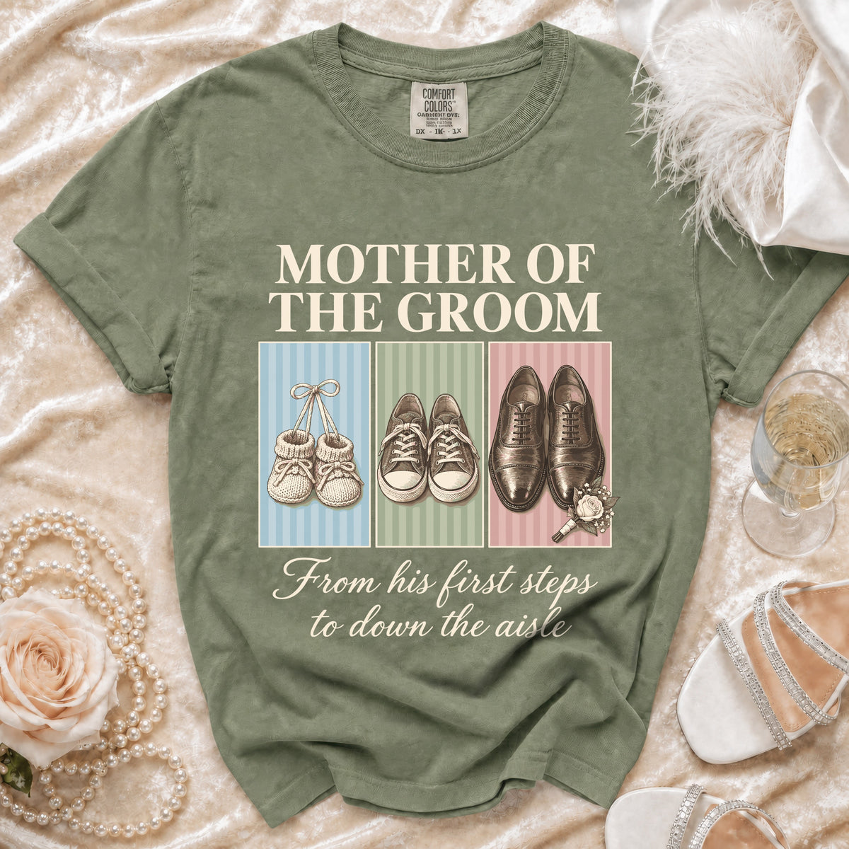 Green t-shirt with "Mother of the Groom" text and shoe illustrations.