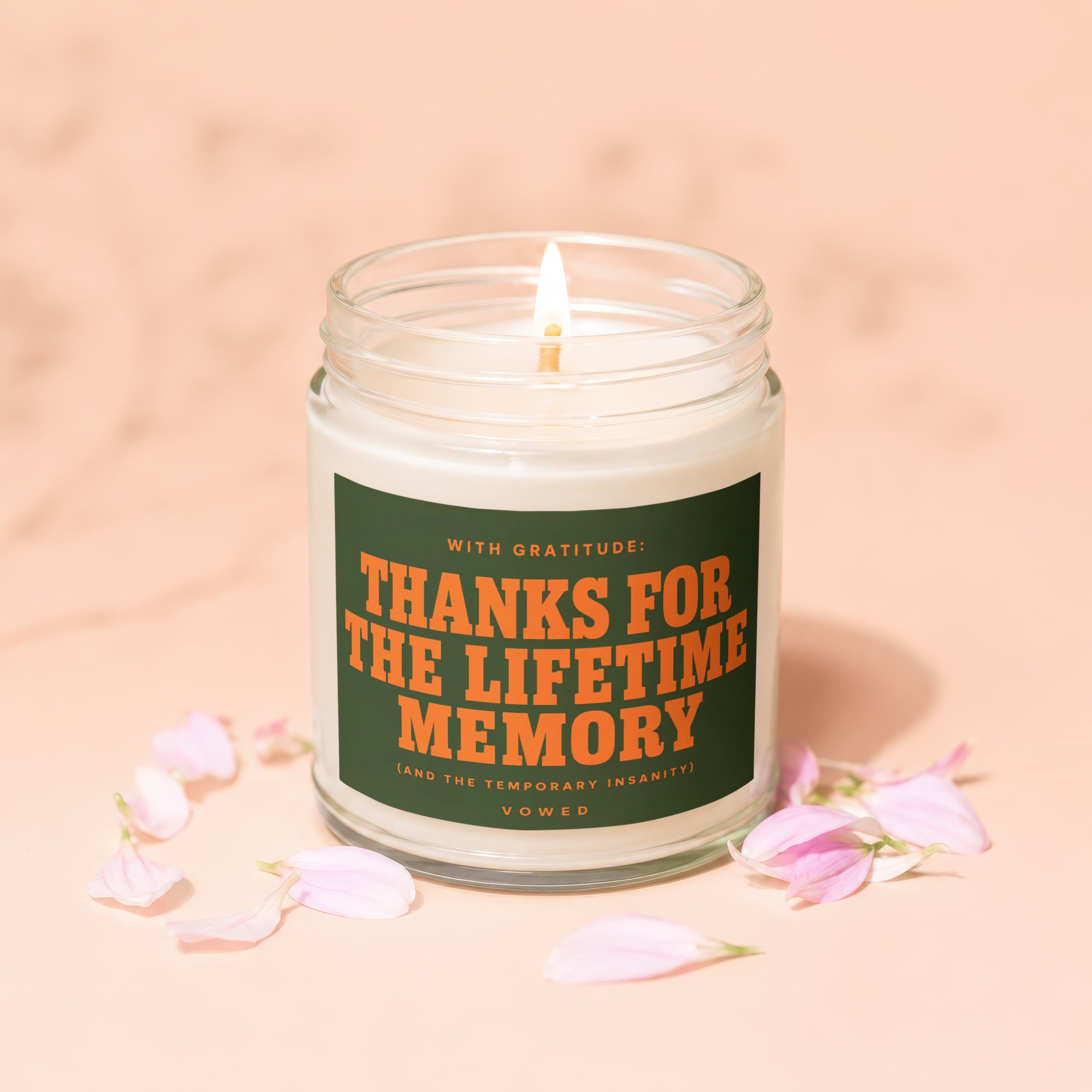Candle with text "Thanks for the Lifetime Memory" and "Vowed" surrounded by petals.