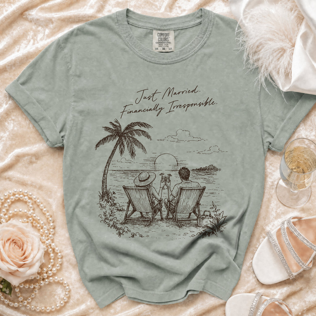 T-shirt with beach graphic and "Just Married. Financially Irresponsible." text.
