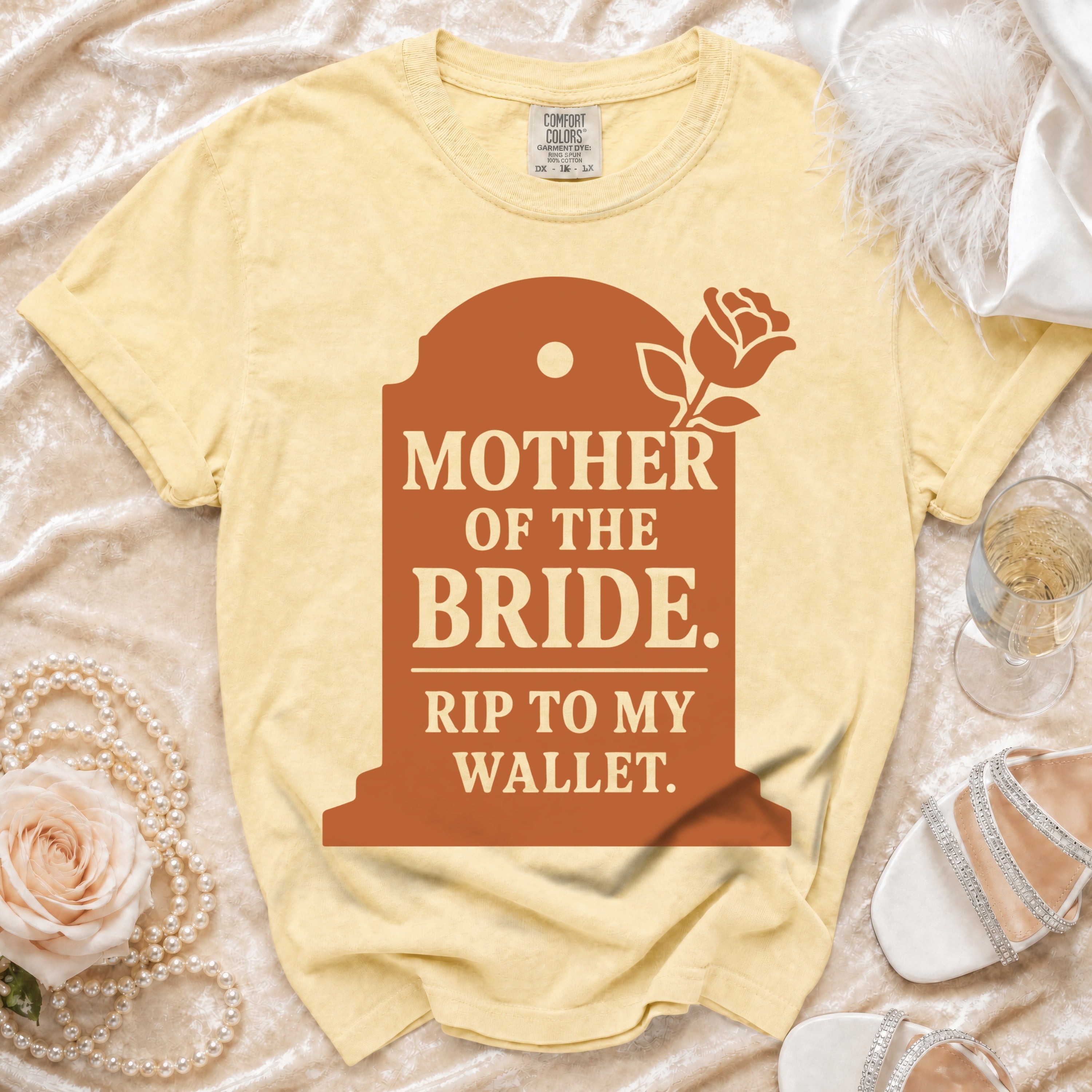 Yellow t-shirt with "Mother of the Bride. Rip To My Wallet." graphic.