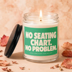 Clear jar candle with green label reading "NO SEATING CHART. NO PROBLEM."