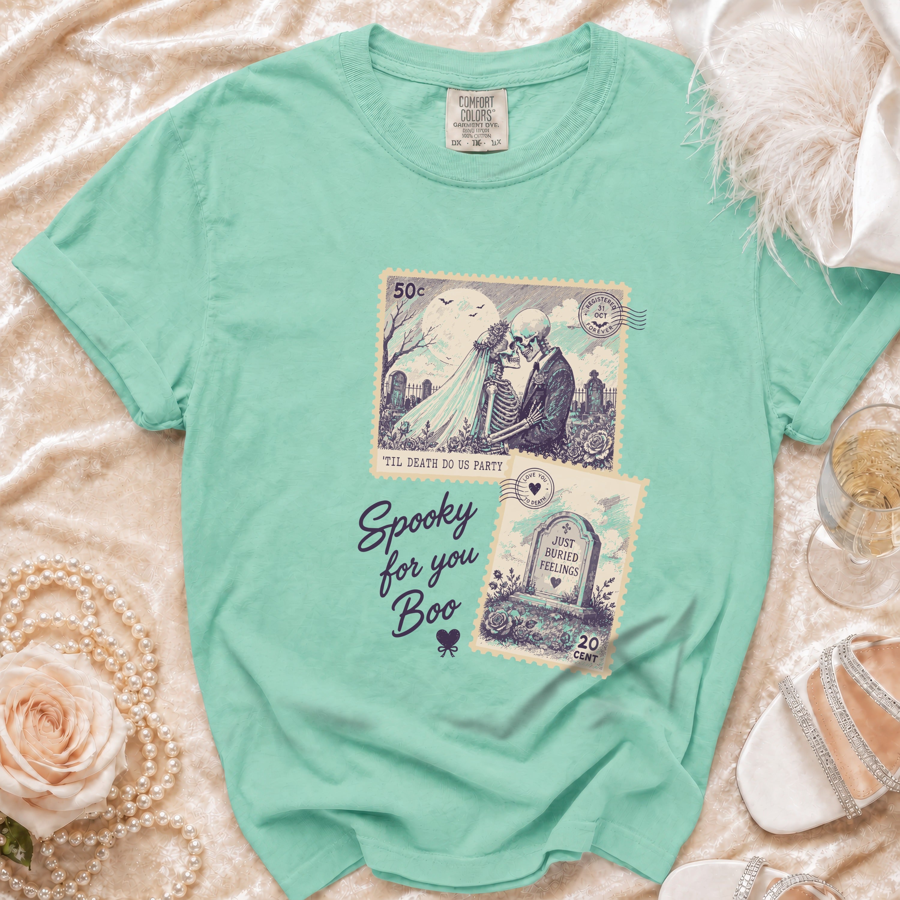 Teal t-shirt with skeleton wedding stamp and "Spooky for you Boo" text.