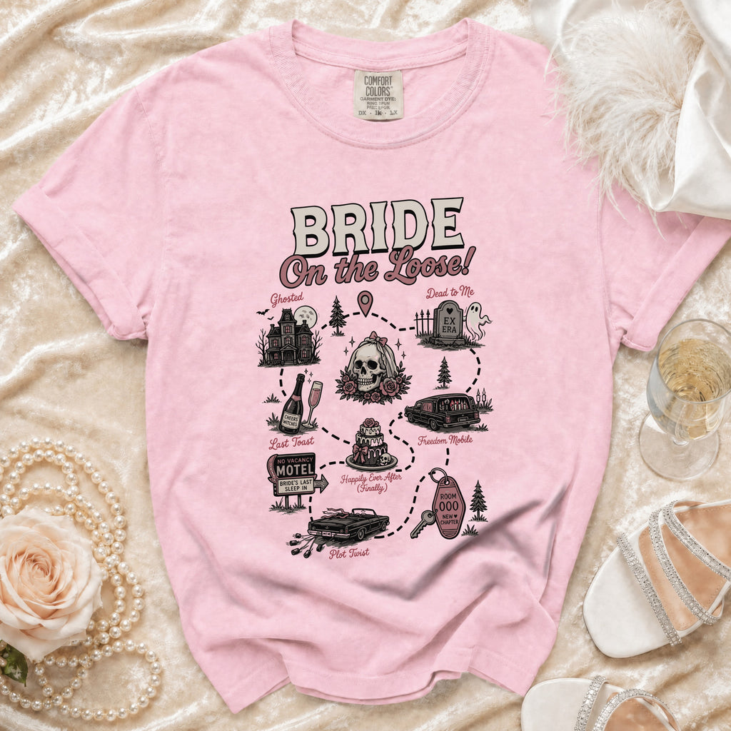 Pink t-shirt with "BRIDE On the Loose!" graphic depicting a humorous wedding journey.
