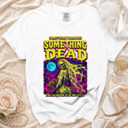 White t-shirt with graphic art of a skeletal bride in a graveyard, with text "SOMETHING BORROWED SOMETHING DEAD".