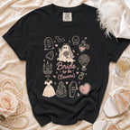 Black t-shirt with "Bride to be (Beware)" ghost bride and gothic wedding graphics.