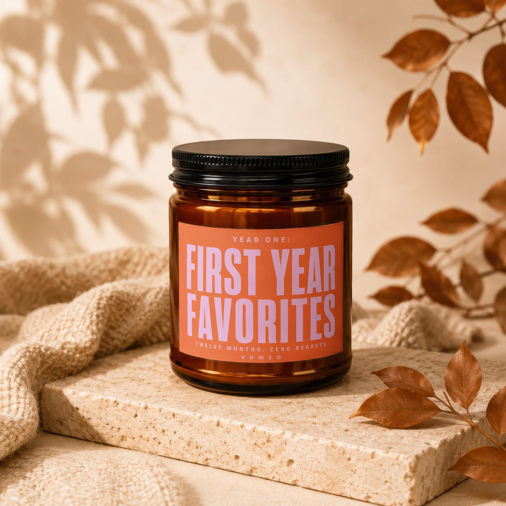 Amber candle with "Year One: First Year Favorites" label, 12 months zero regrets.