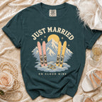 "Just Married on Cloud Nine" graphic tee with skis, mountains, and wedding rings.