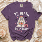 Purple t-shirt with skeleton bride graphic and text "Til Death Do Us Party."