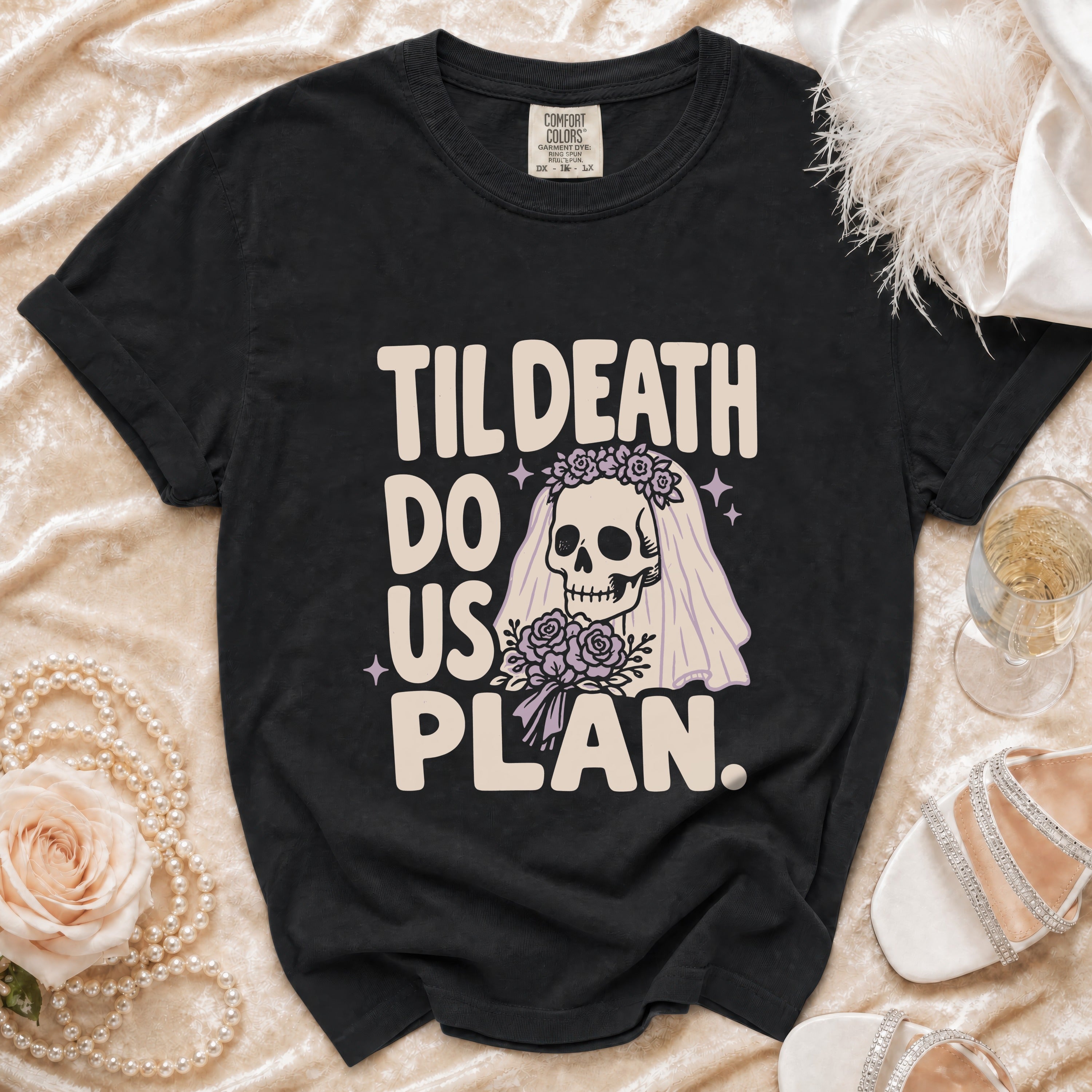 Black t-shirt with "Til Death Do Us Plan" text and skull graphic.
