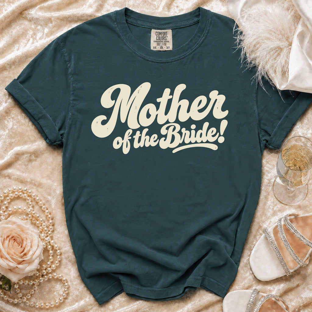 Teal t-shirt with "Mother of the Bride!" text in cream script font.