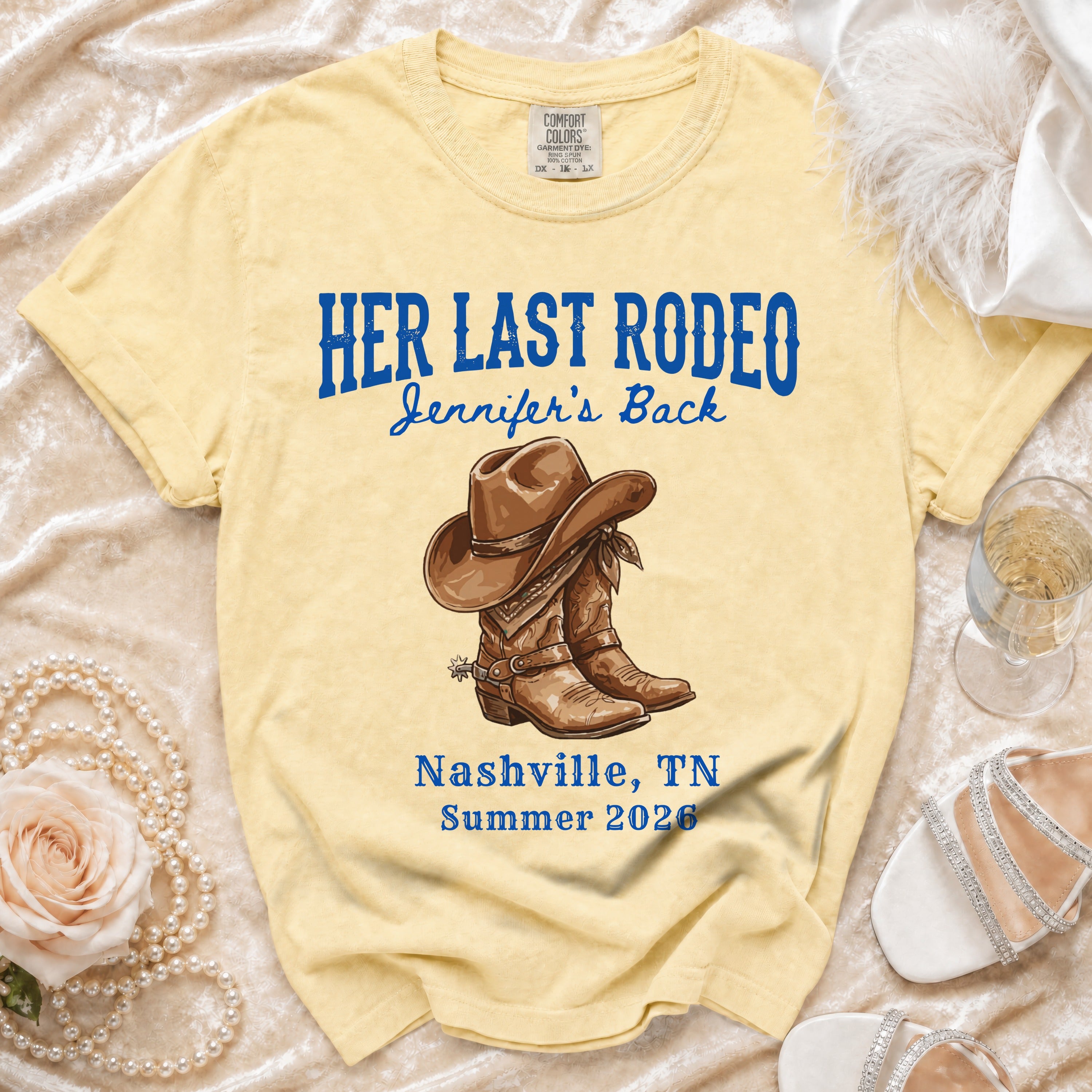 Yellow t-shirt with "Her Last Rodeo Jennifer's Back" and cowboy boots.