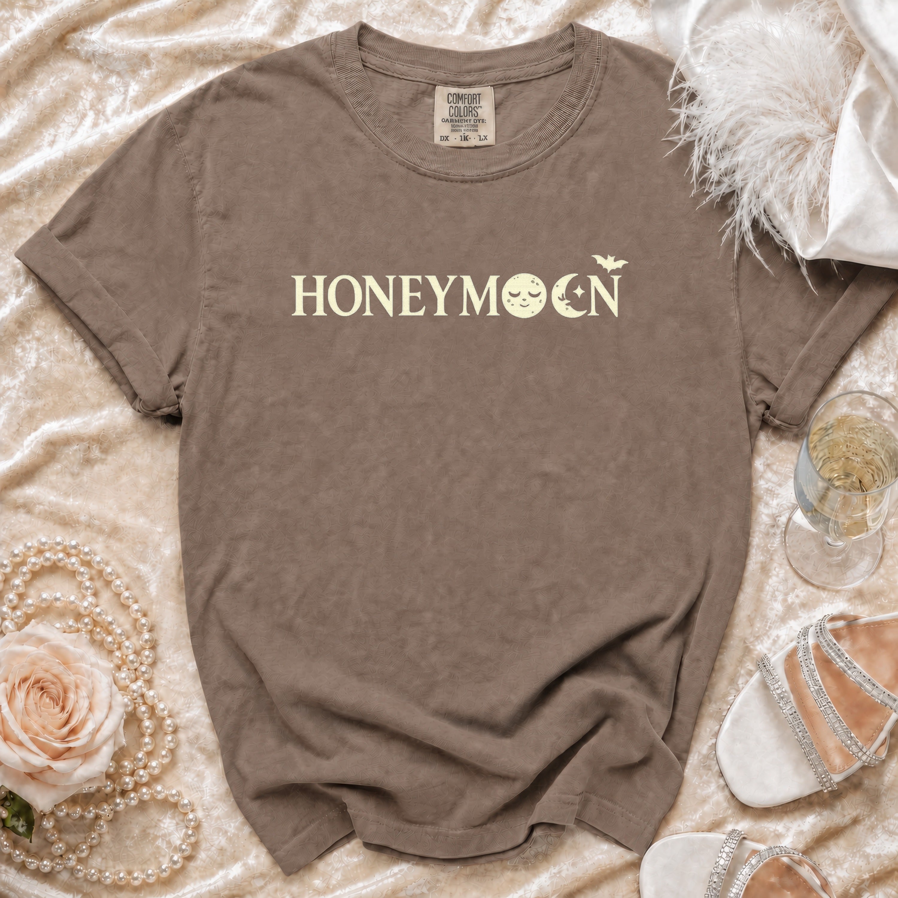 Brown t-shirt with "HONEYMOON" text and moon graphic.