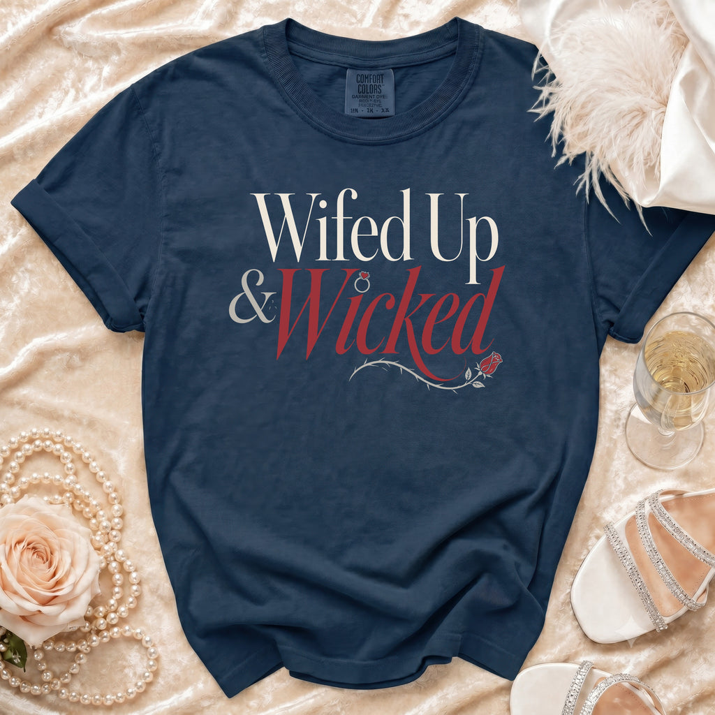 Navy Comfort Colors t-shirt with "Wifed Up & Wicked" text and rose graphic.