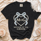 Black shirt with "MoG" and "Mother of the Groom" text and pearl heart design.