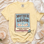 Yellow t-shirt with "Mother of the Groom Wedding Weekend Social Club" text and swans graphic.