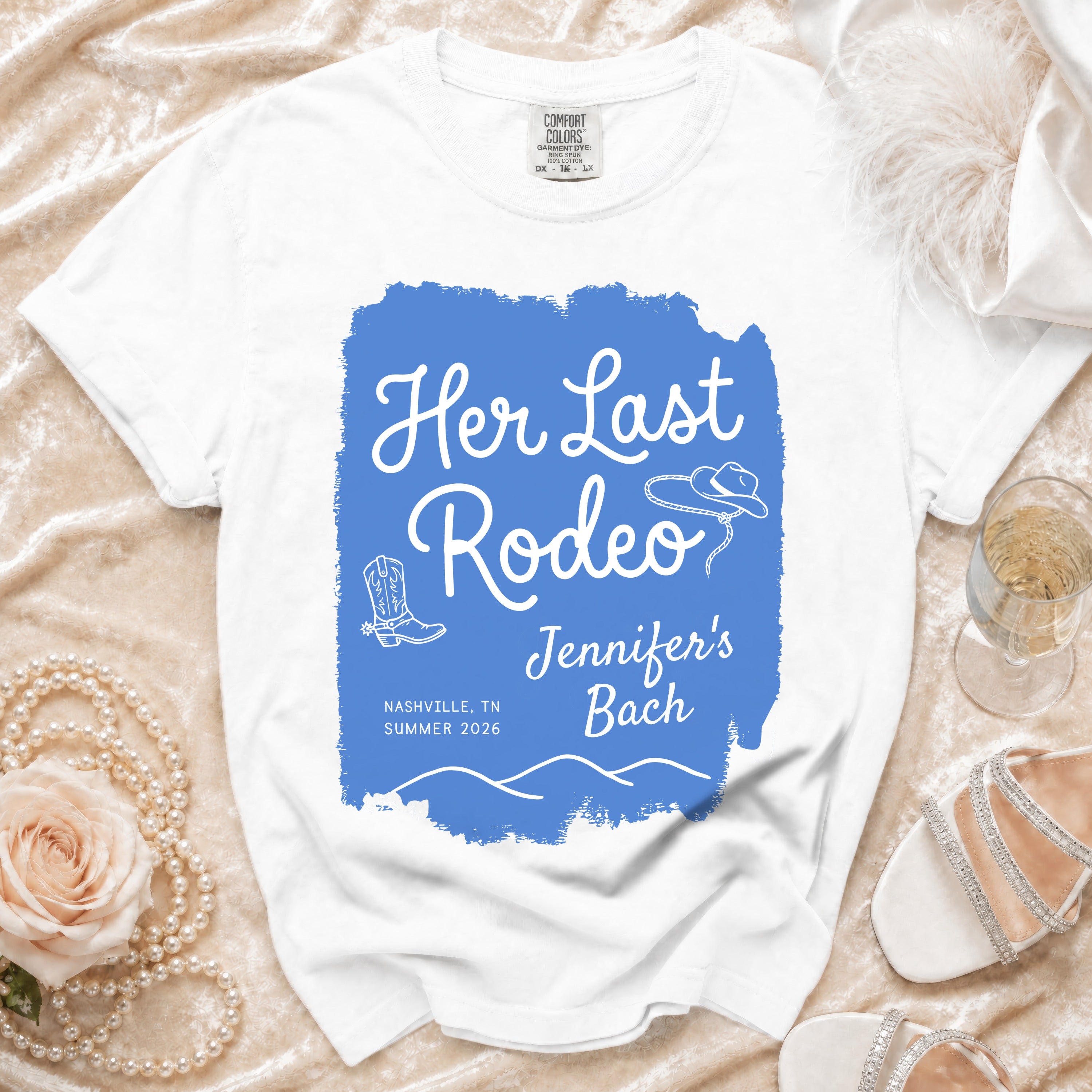 White t-shirt with "Her Last Rodeo Jennifer's Bach Nashville TN Summer 2026" text.