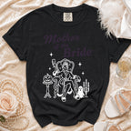Black t-shirt with "Mother of the Bride" text and gothic illustration.