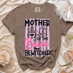Brown t-shirt with "Mother of the Bride Bewitched" graphic, cauldron, and witch hat.