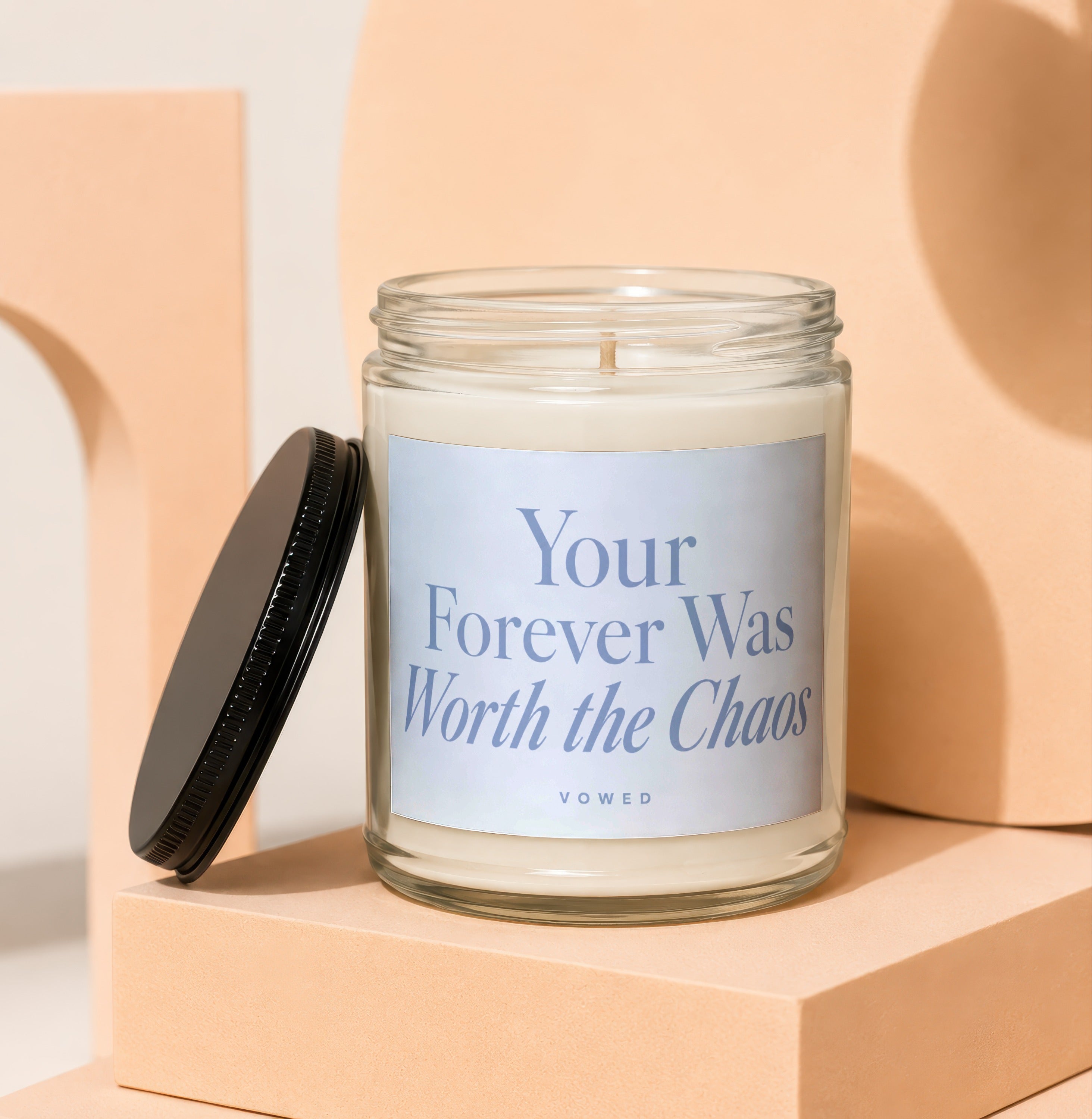 Candle with text "Your Forever Was Worth the Chaos" by VOWED.