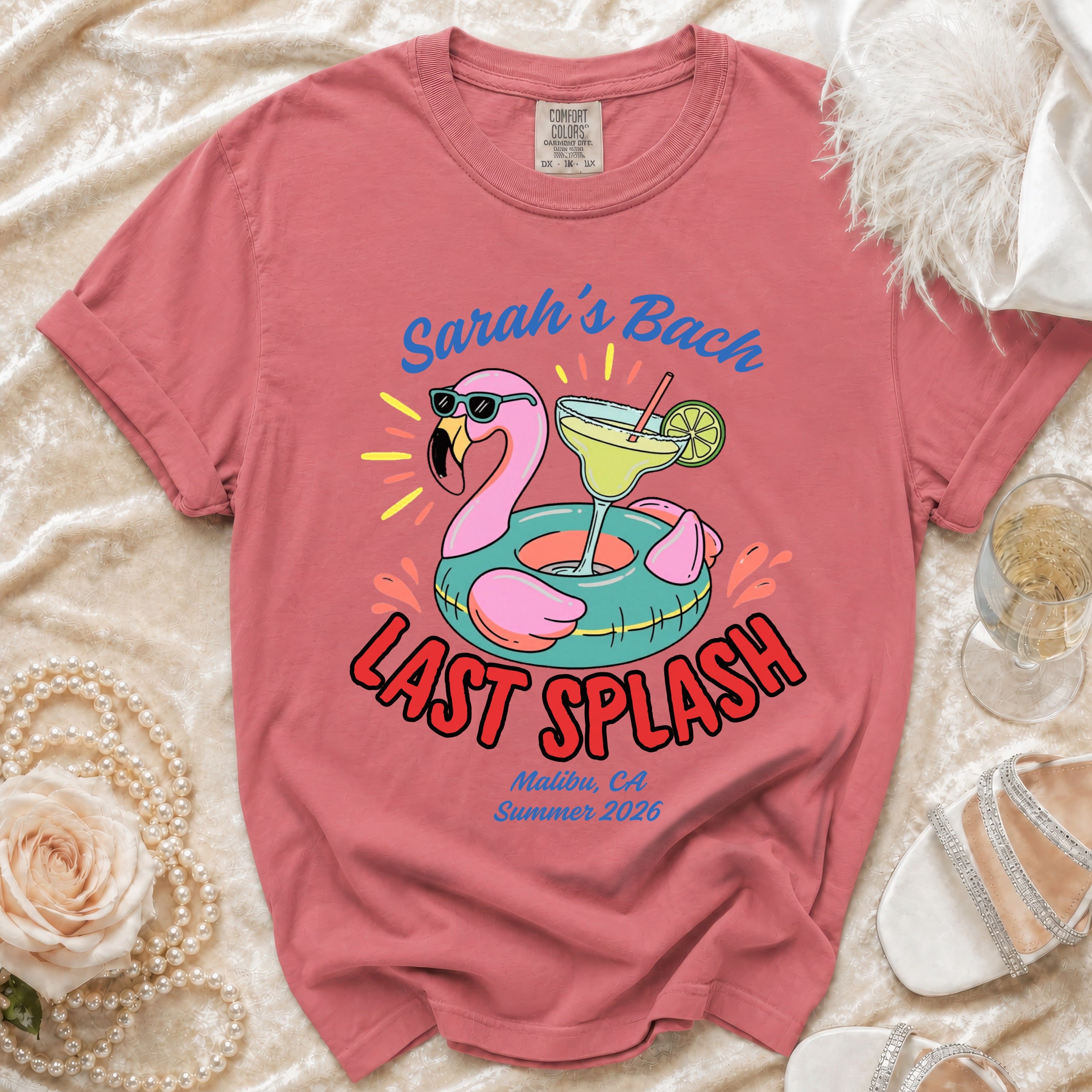 Pink t-shirt with "Sarah's Bach LAST SPLASH Malibu, CA Summer 2026" and flamingo.