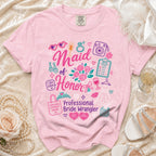 Pink t-shirt with "Maid of Honor: Professional Bride Wrangler" graphic and wedding icons.