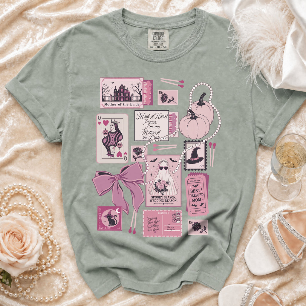 Green t-shirt with "Mother of the Bride" themed graphics including a haunted house, pumpkins, and pearls.