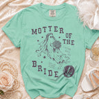 Mint green t-shirt with a ghost bride graphic that reads "MOTHER OF THE BRIDE".