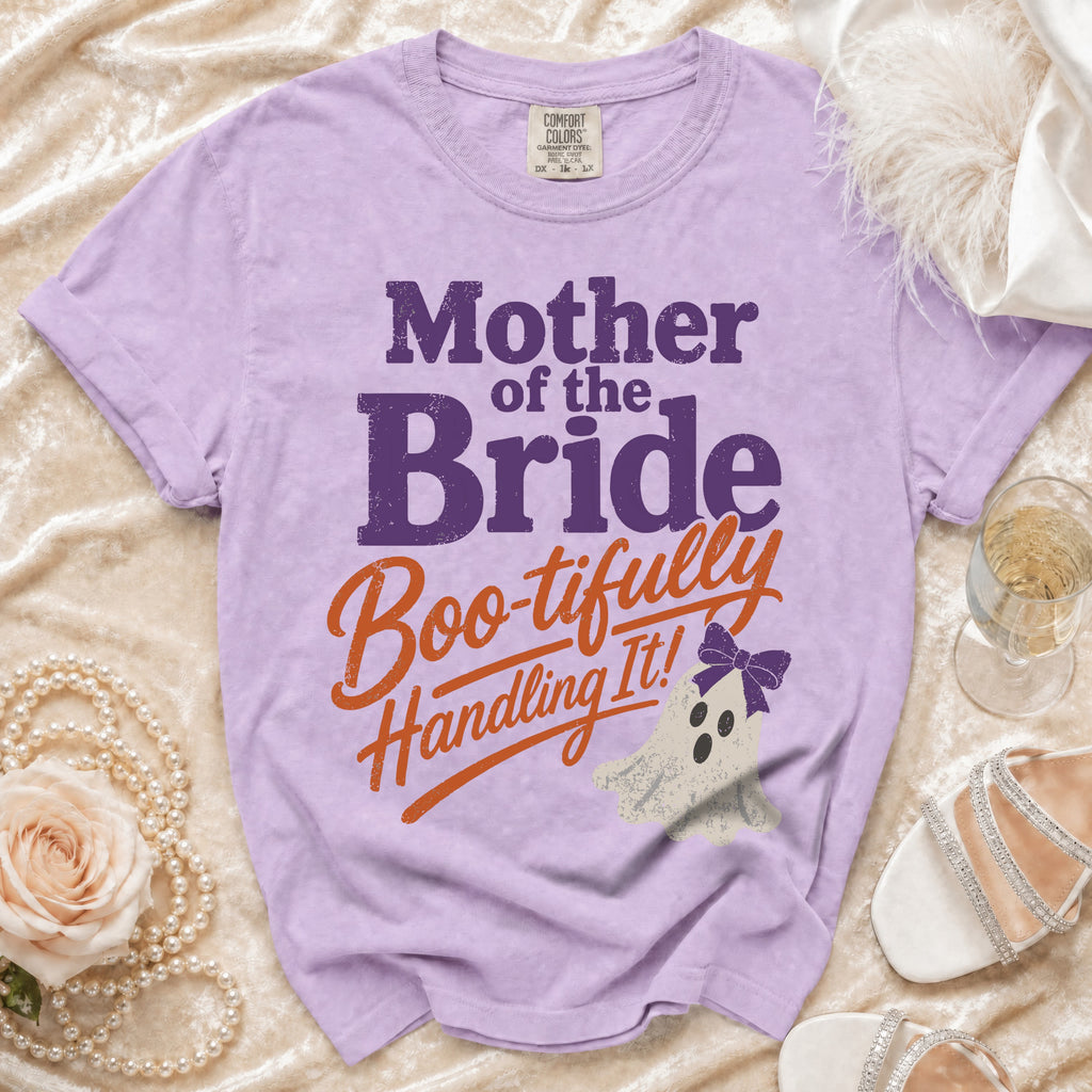 Purple Comfort Colors t-shirt with "Mother of the Bride Boo-tifully Handling It!" text and ghost graphic.