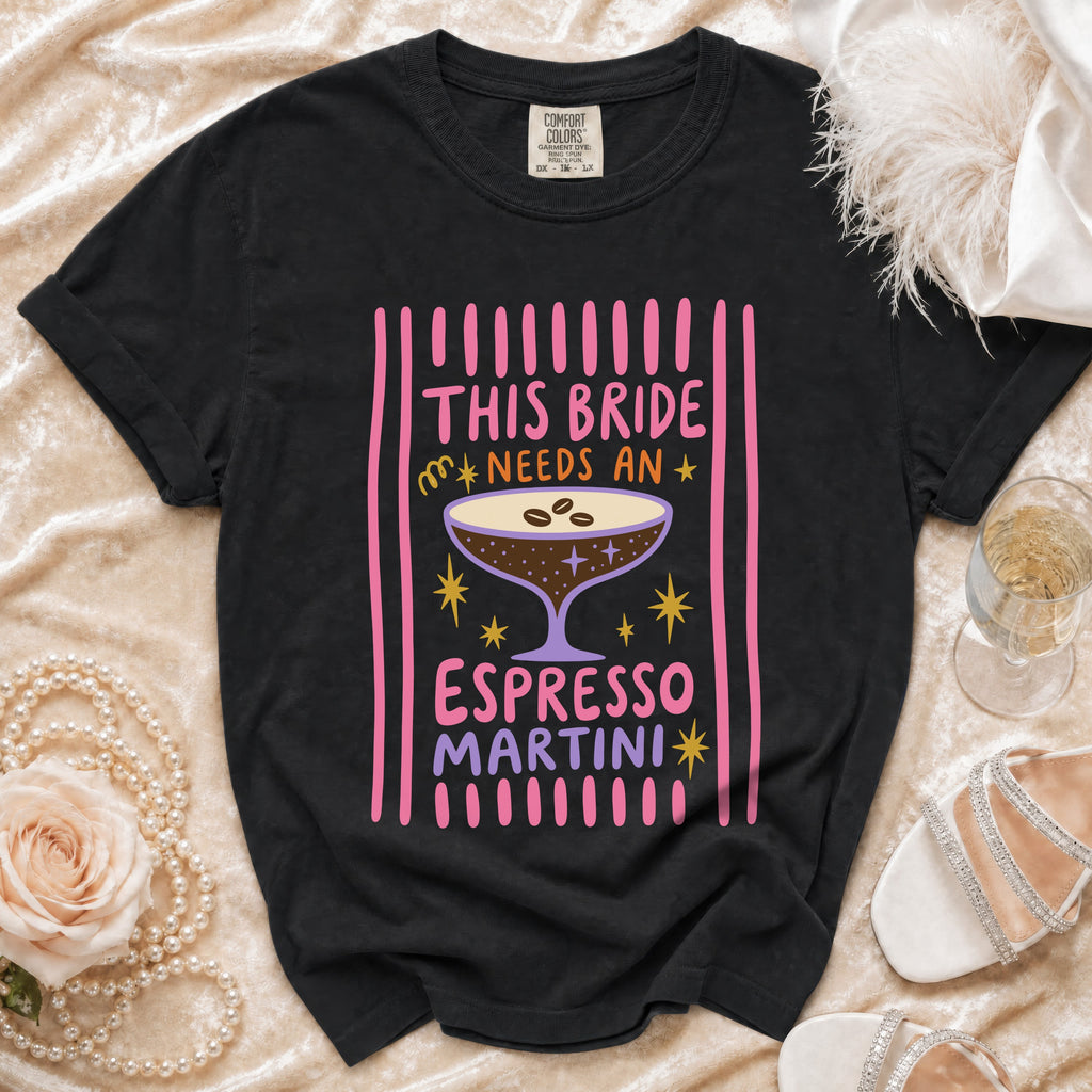 Black t-shirt with "This Bride Needs An Espresso Martini" graphic and martini glass.