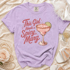 Lavender t-shirt with "This Girl Needs a Spicy Marg" graphic and margarita.