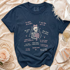Navy t-shirt with skeleton bride graphic and humorous wedding-themed text.