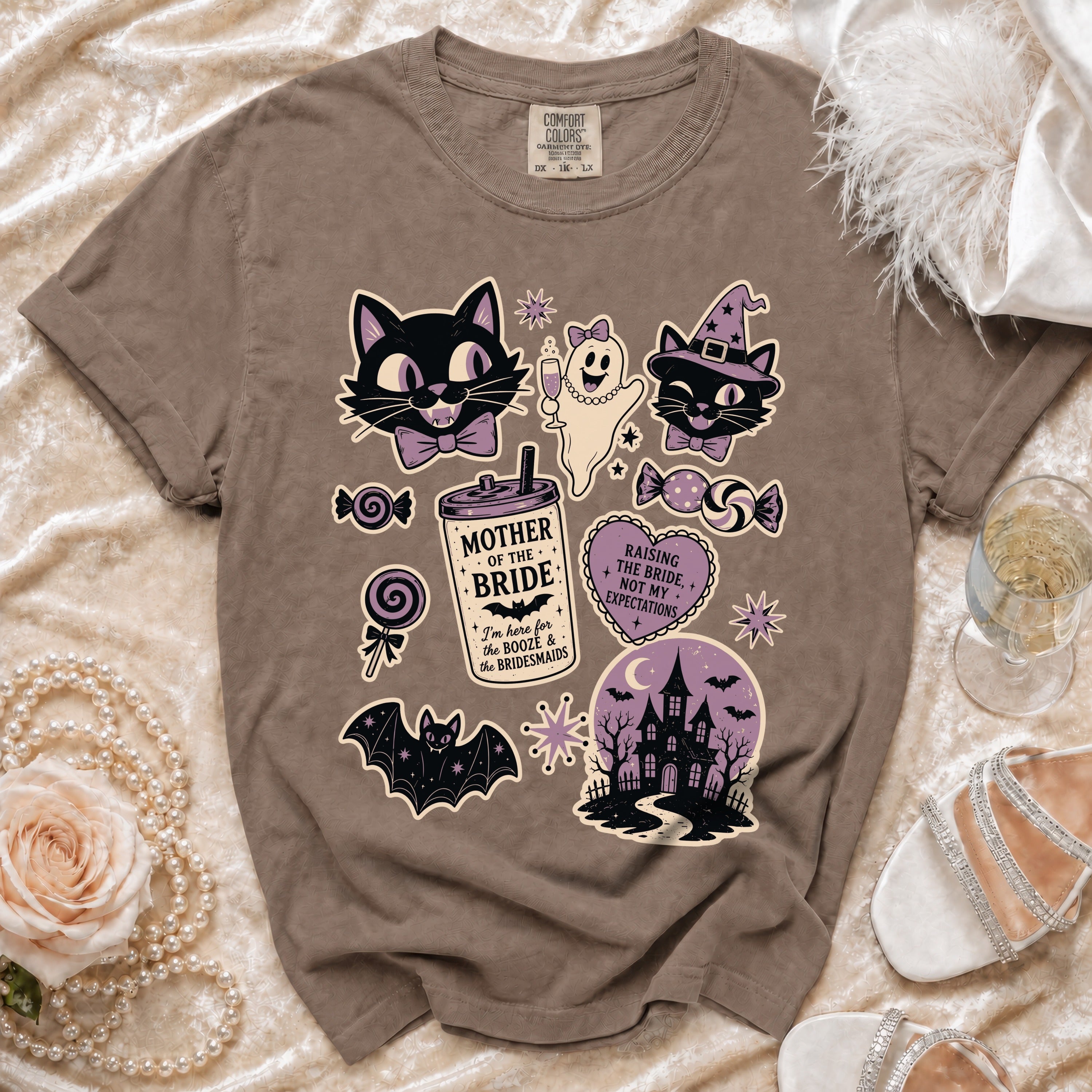 Brown t-shirt with Halloween-themed "Mother of the Bride" and bridesmaid graphics.