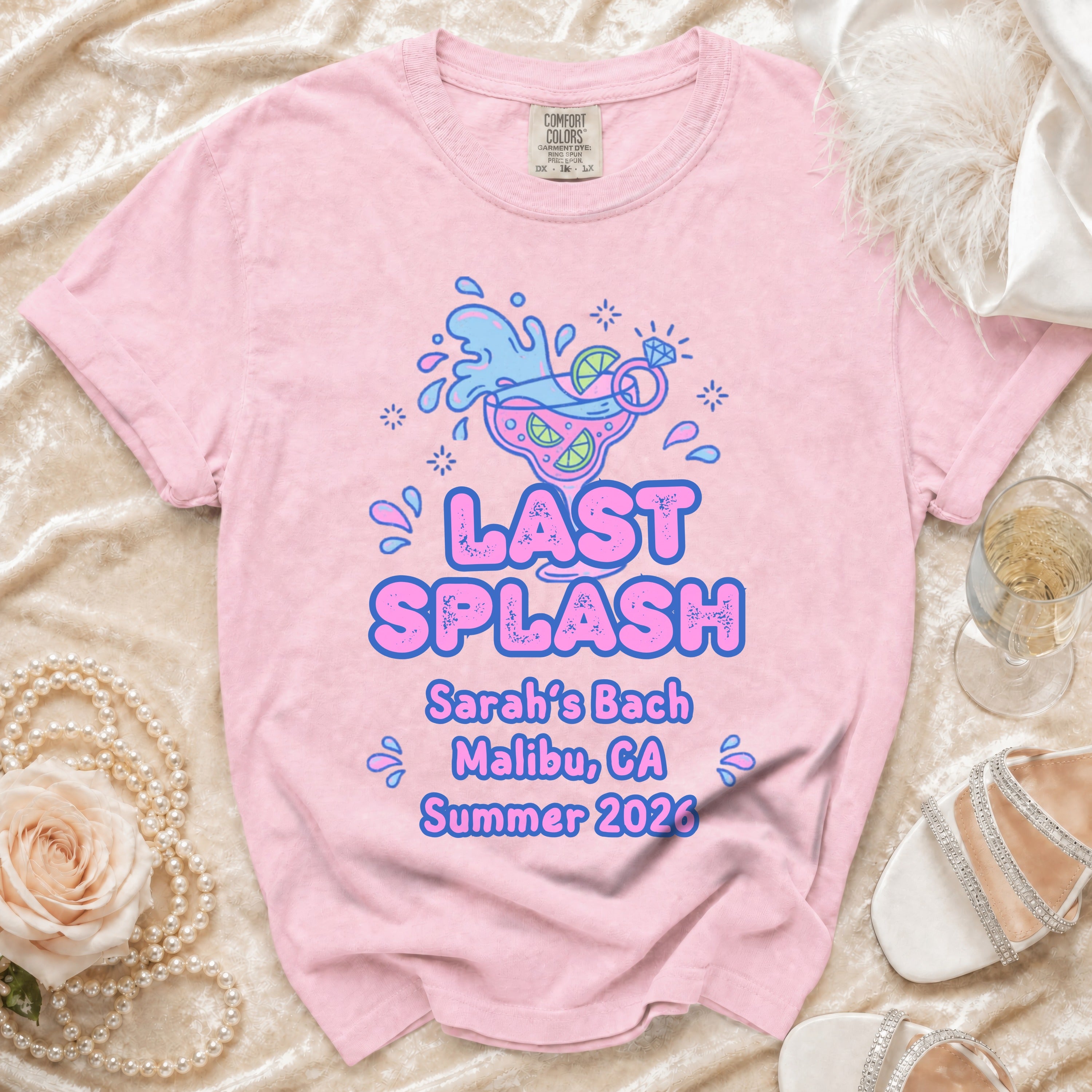 Pink t-shirt with "Last Splash Sarah's Bach Malibu CA Summer 2026" design.